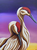 Artistic depiction of two cranes with a purple and yellow gradient background